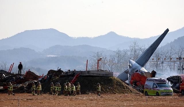 韩国失事客机 事故调查正在进行中 两个黑匣子寻获